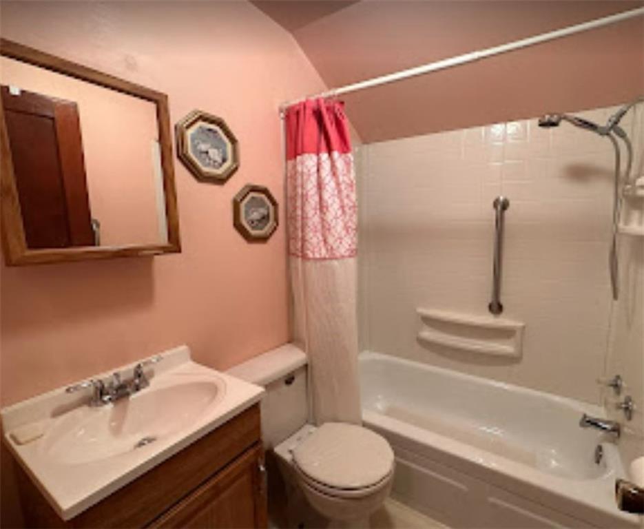 89 Thomas Street Crafton, PA 15205 - Photo 9 of 13 a bathroom with a sink mirror vanity and toilet