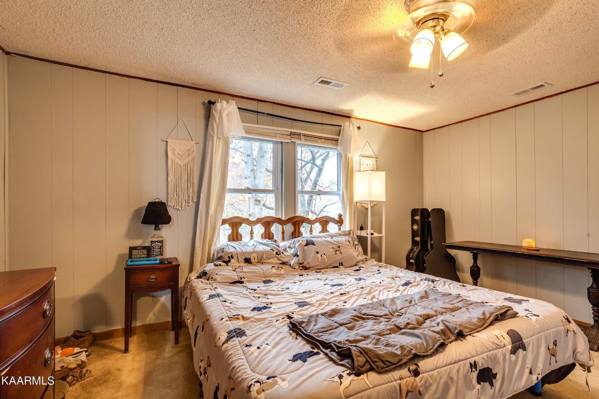 2018 Rhea Road Knoxville, TN 37920 - Photo 16 of 28 a bedroom with a bed and wooden floor