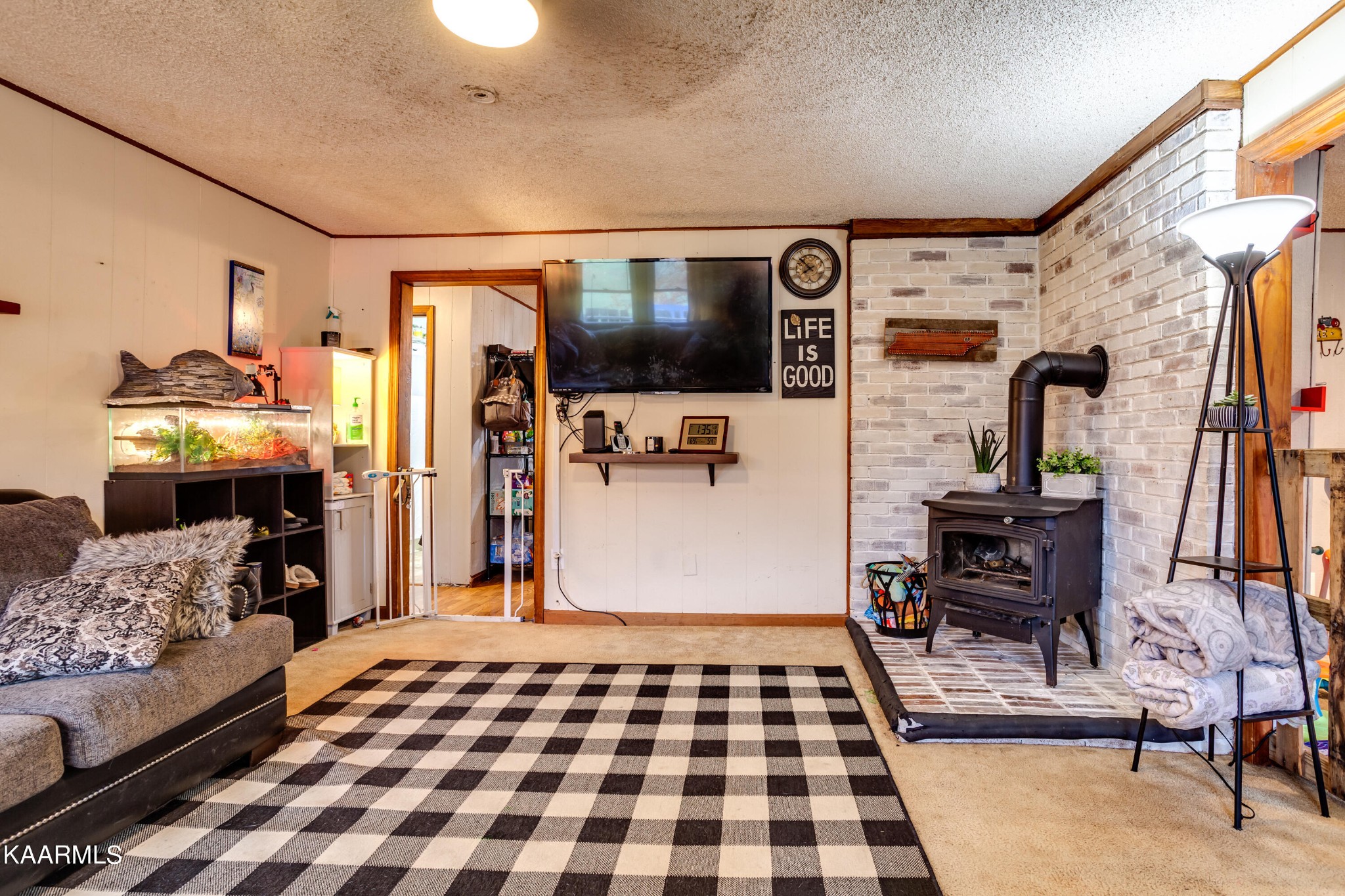 2018 Rhea Road Knoxville, TN 37920 - Photo 9 of 28 a bedroom with furniture and a flat screen tv