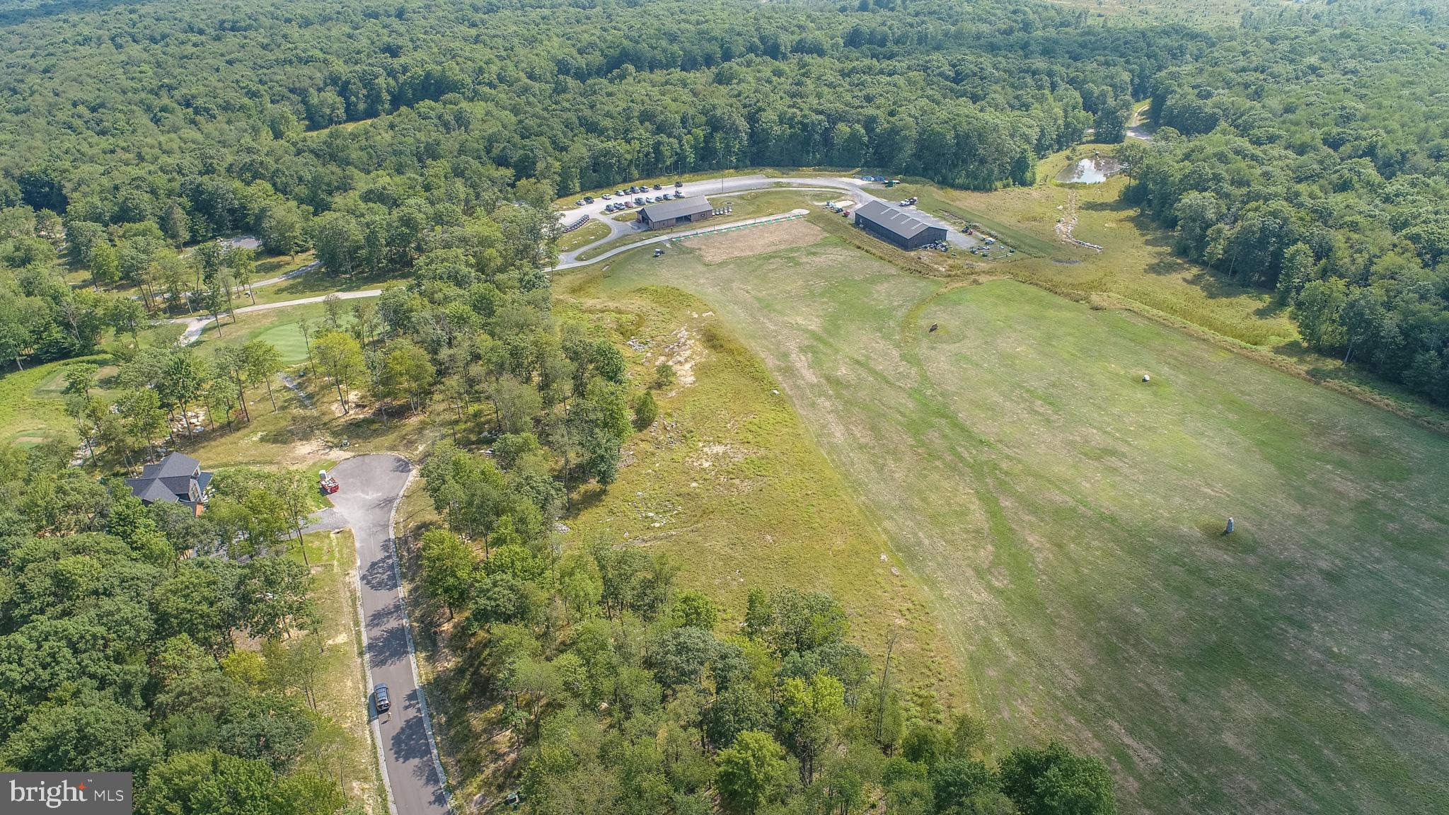 6 Irwin Way Oakland, MD 21550 - Photo 7 of 13 a view of a yard with an outdoor space
