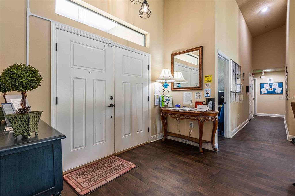 Undisclosed Address Spring Hill, FL 34608 - Photo 5 of 39 a view of kitchen with furniture and wooden floor