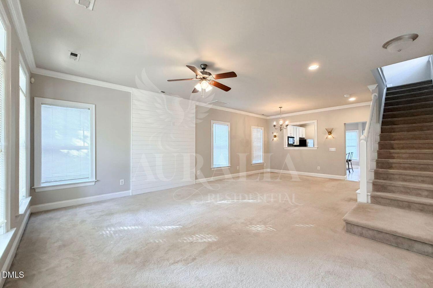 7754 ACC Boulevard Raleigh, NC 27617 - Photo 3 of 41 a view of empty room with ceiling fan