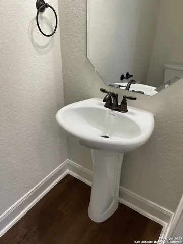 a kitchen with stainless steel appliances kitchen island granite countertop a stove a sink and a microwave