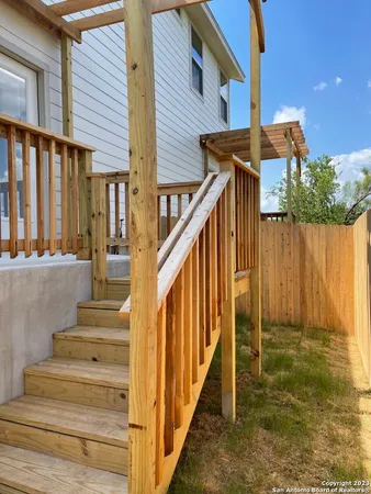 a view of a backyard of the house