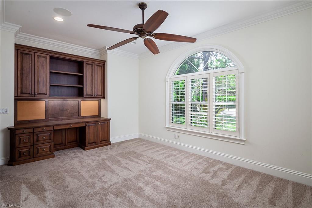 122 Caribbean Road Naples, FL 34108 - Photo 13 of 31 a room with furniture and window