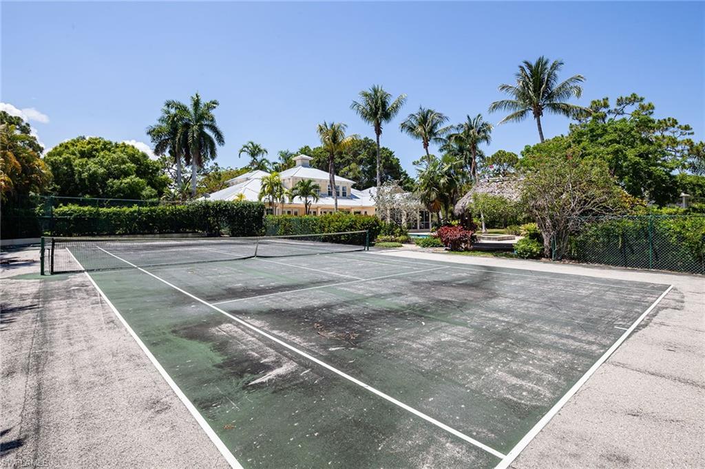 122 Caribbean Road Naples, FL 34108 - Photo 21 of 31 a view of a backyard of a house