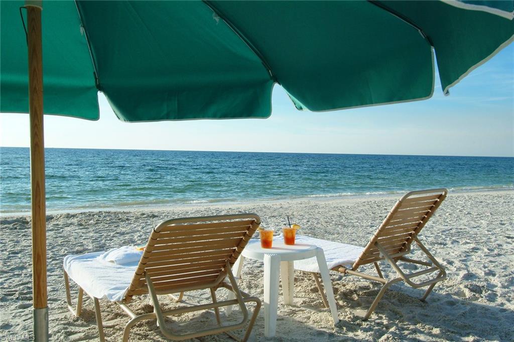 122 Caribbean Road Naples, FL 34108 - Photo 31 of 31 a view of outdoor space with seating area