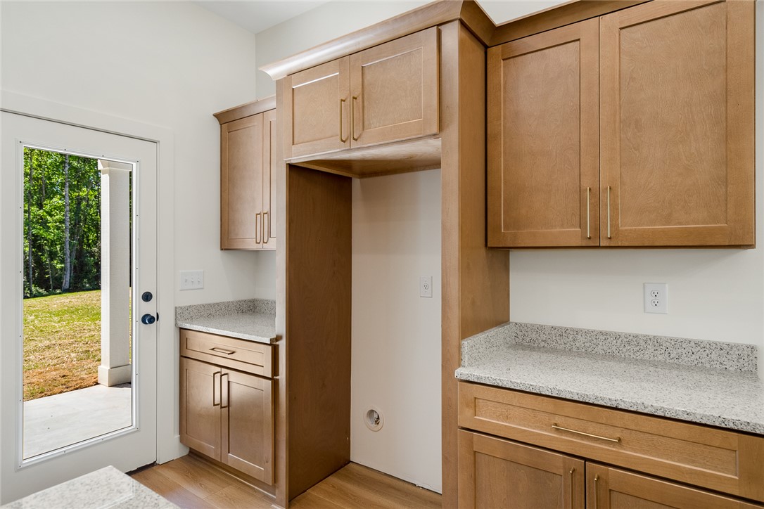 2125 A Honea Path Park Road Anderson, SC 29625 - Photo 11 of 26 This spacious utility area offers abundant storage and direct outdoor access.