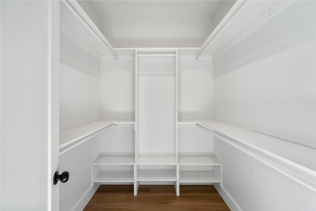 2125 A Honea Path Park Road Anderson, SC 29625 - Photo 16 of 26 This spacious walk-in closet offers ample storage and organization solutions for any wardrobe.