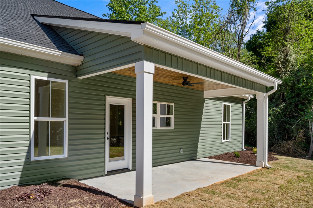 2125 A Honea Path Park Road Anderson, SC 29625 - Photo 21 of 26 This newly constructed home boasts a spacious patio for outdoor living and entertaining.