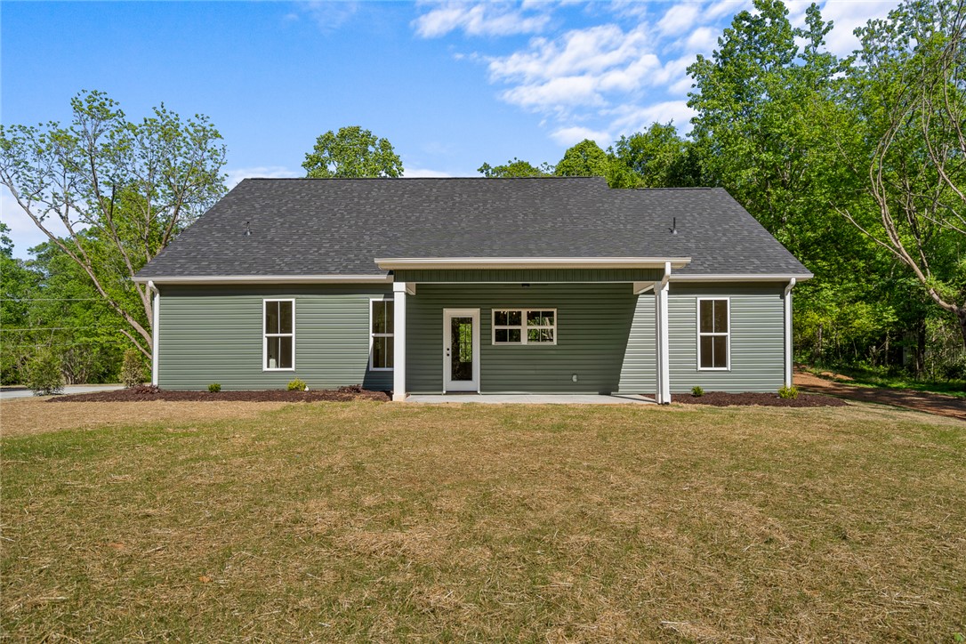 2125 A Honea Path Park Road Anderson, SC 29625 - Photo 23 of 26 This charming home offers a spacious backyard, perfect for outdoor enjoyment and relaxation.