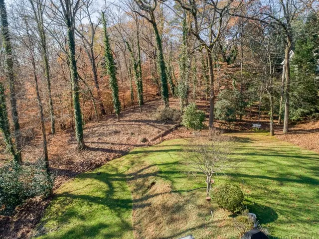a view of swimming pool with a yard