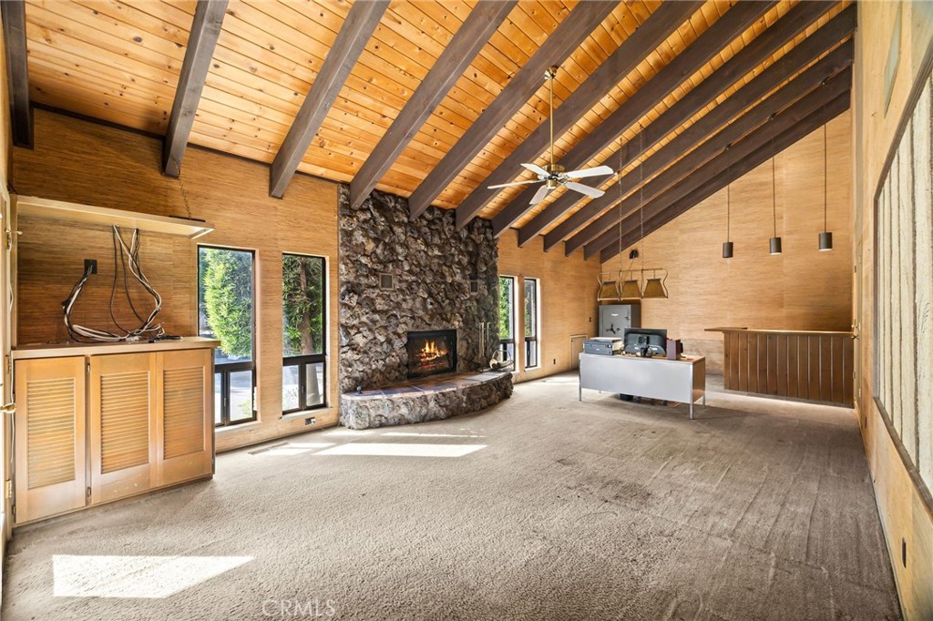 6357 County Road 48 Willows, CA 95988 - Photo 13 of 75 a view of a porch with wooden floor and a fireplace