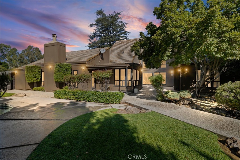 6357 County Road 48 Willows, CA 95988 - Photo 2 of 75 a front view of a house with yard and green space