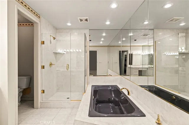 a kitchen with granite countertop a sink and cabinets