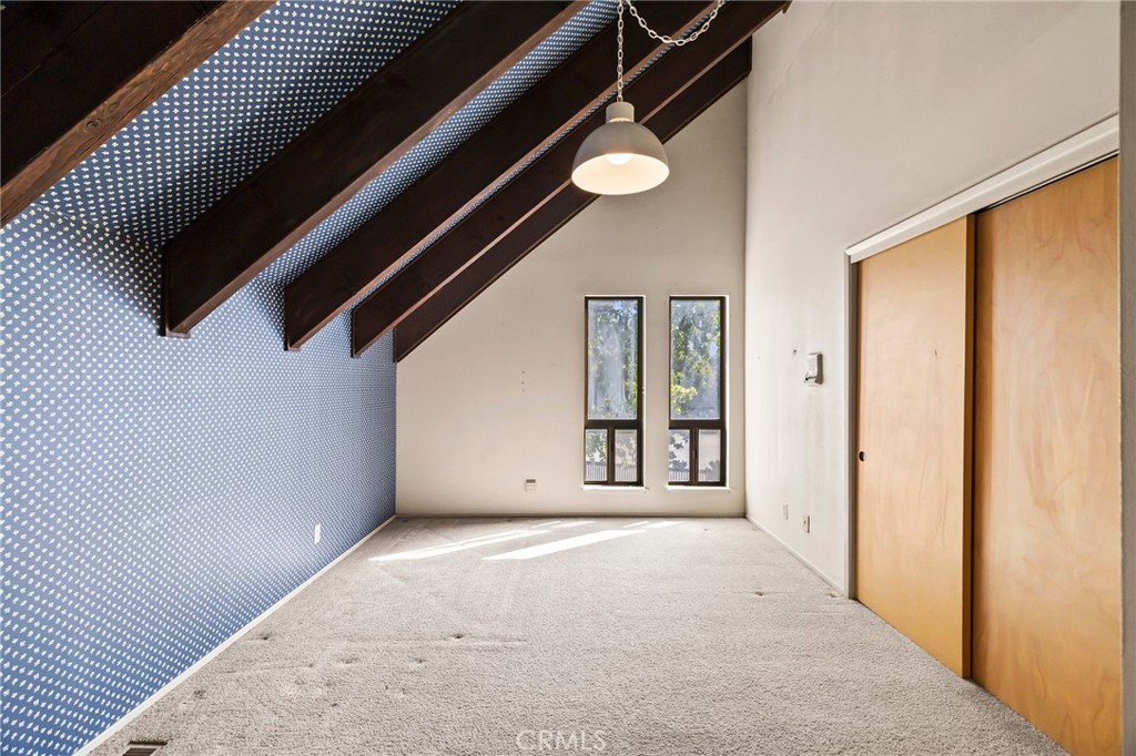 6357 County Road 48 Willows, CA 95988 - Photo 40 of 75 a view of an empty room with wooden floor and windows