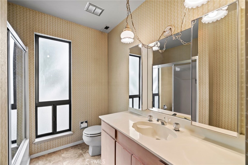 6357 County Road 48 Willows, CA 95988 - Photo 41 of 75 a bathroom with a sink a toilet and shower