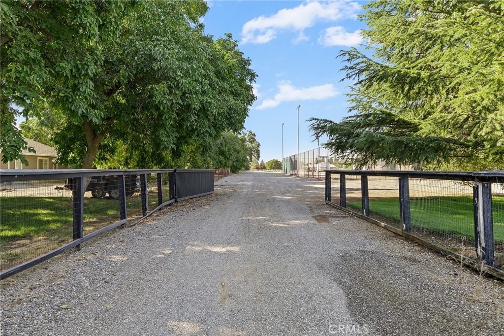 6357 County Road 48 Willows, CA 95988 - Photo 46 of 75 a view of a fence and trees in the background