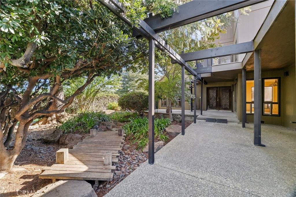 6357 County Road 48 Willows, CA 95988 - Photo 5 of 75 a view of a patio with table and chairs and potted plants