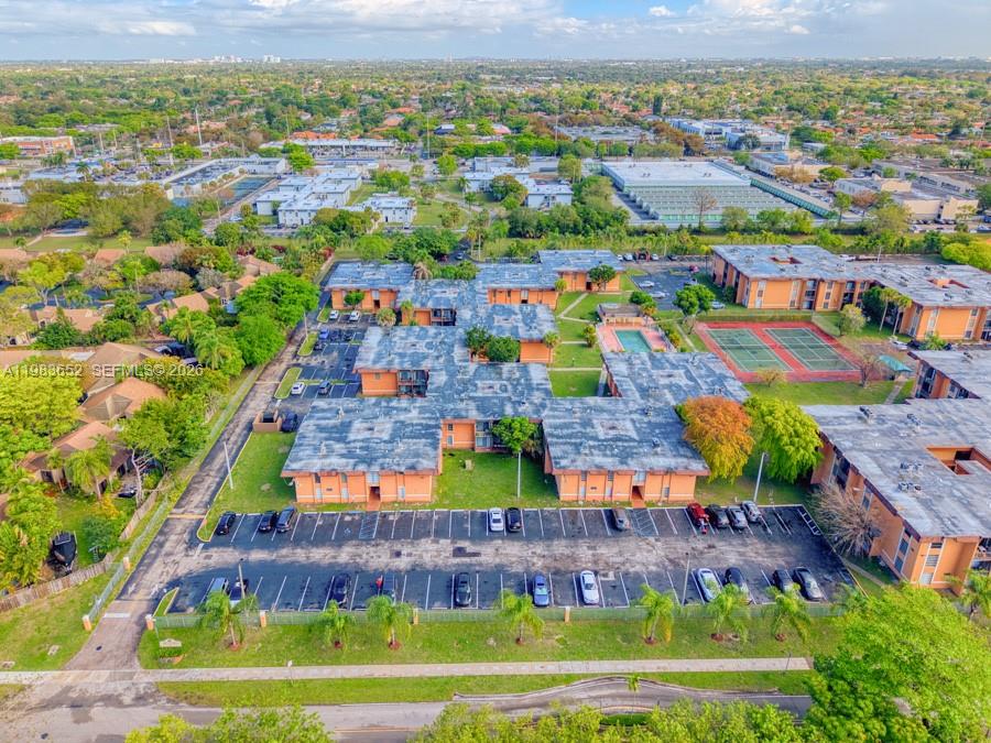9459 Southwest 76th Street, Unit R5 Miami, FL 33173 - Photo 33 of 33 an aerial view of multiple house