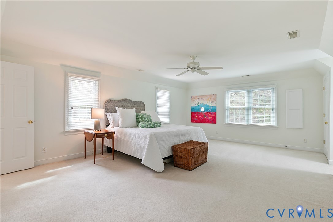 2130 Manakin Road Manakin-Sabot, VA 23103 - Photo 28 of 65 a spacious bedroom with a bed and a window