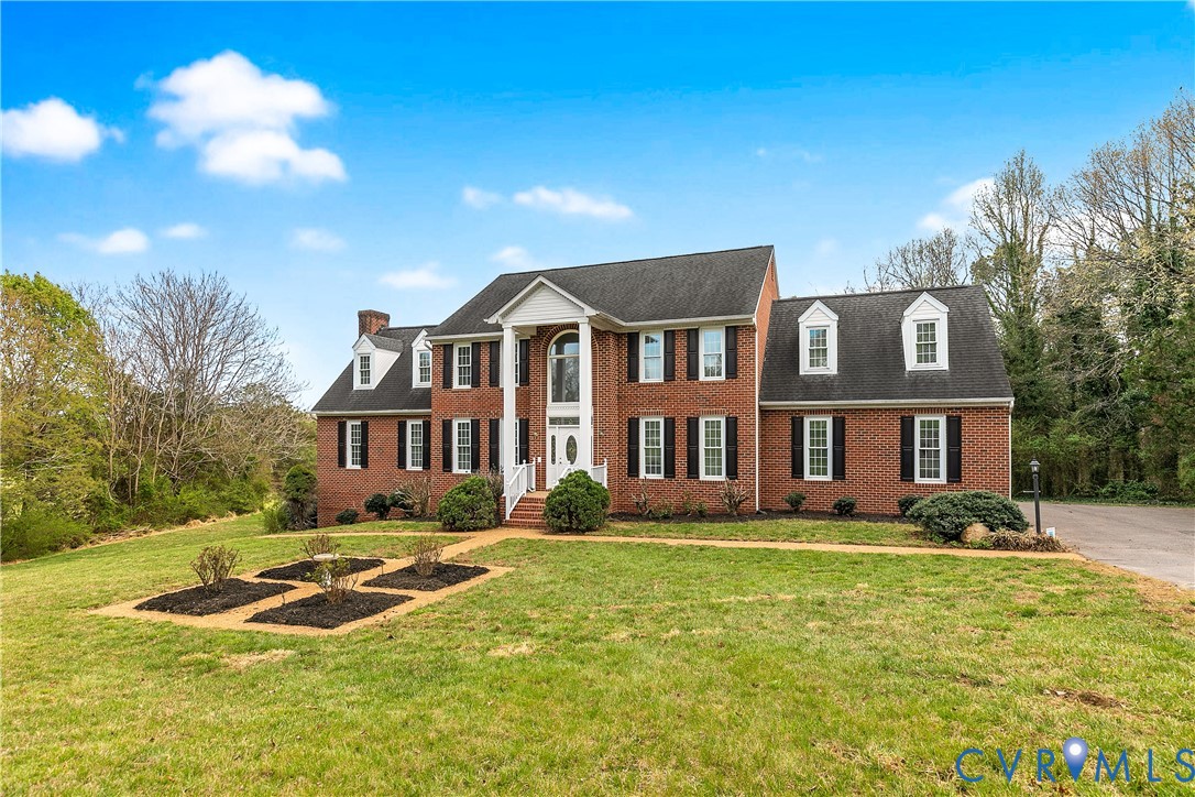 2130 Manakin Road Manakin-Sabot, VA 23103 - Photo 3 of 65 a front view of a house with a yard