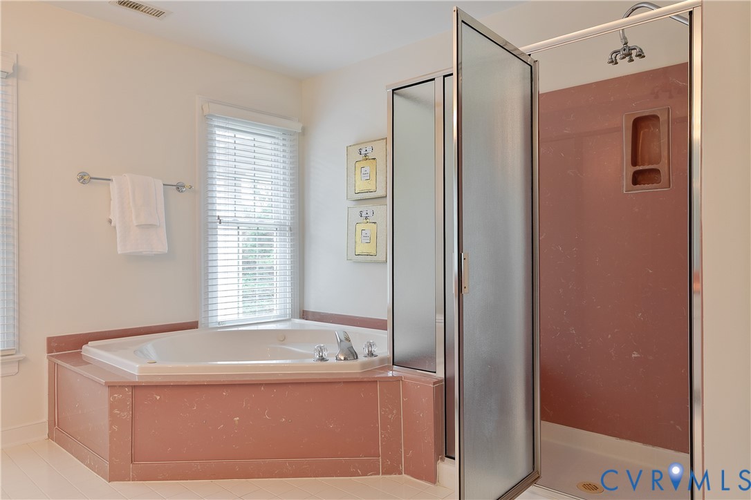 2130 Manakin Road Manakin-Sabot, VA 23103 - Photo 35 of 65 a bathroom with a tub and shower