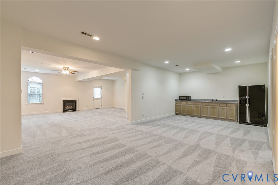 2130 Manakin Road Manakin-Sabot, VA 23103 - Photo 43 of 65 a view of an empty room with a kitchen
