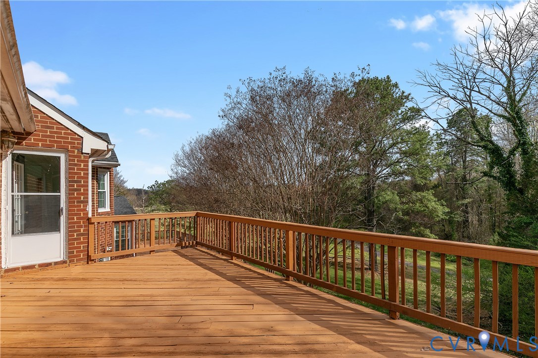 2130 Manakin Road Manakin-Sabot, VA 23103 - Photo 51 of 65 a view of a balcony with wooden floor and fence