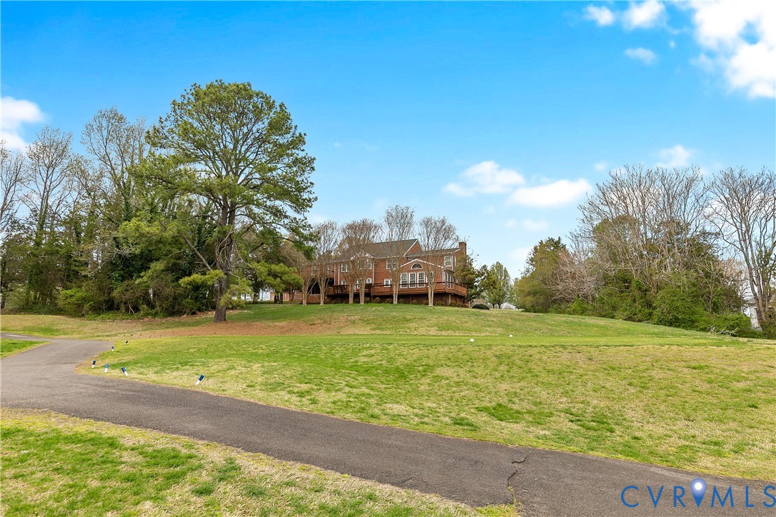 2130 Manakin Road Manakin-Sabot, VA 23103 - Photo 56 of 65 a view of a field with a trees in the background