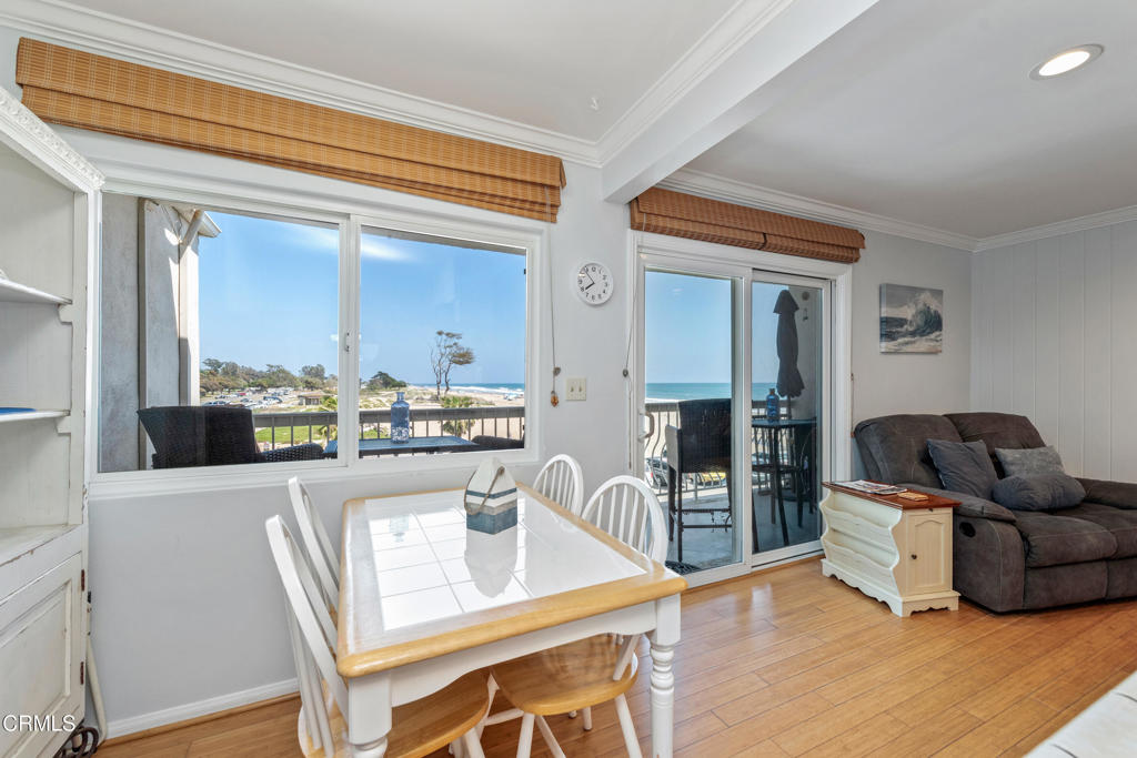 4975 Sandyland Road, Unit 302 Carpinteria, CA 93013 - Photo 12 of 28 a living room with furniture and a table