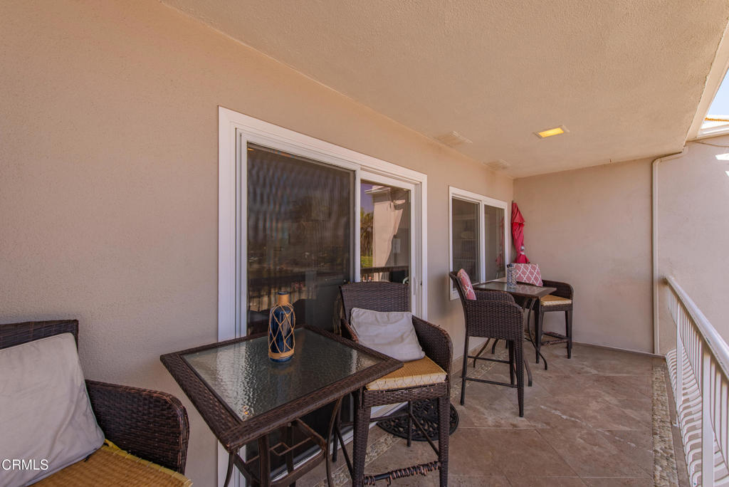 4975 Sandyland Road, Unit 302 Carpinteria, CA 93013 - Photo 17 of 28 a view of a dining room with furniture