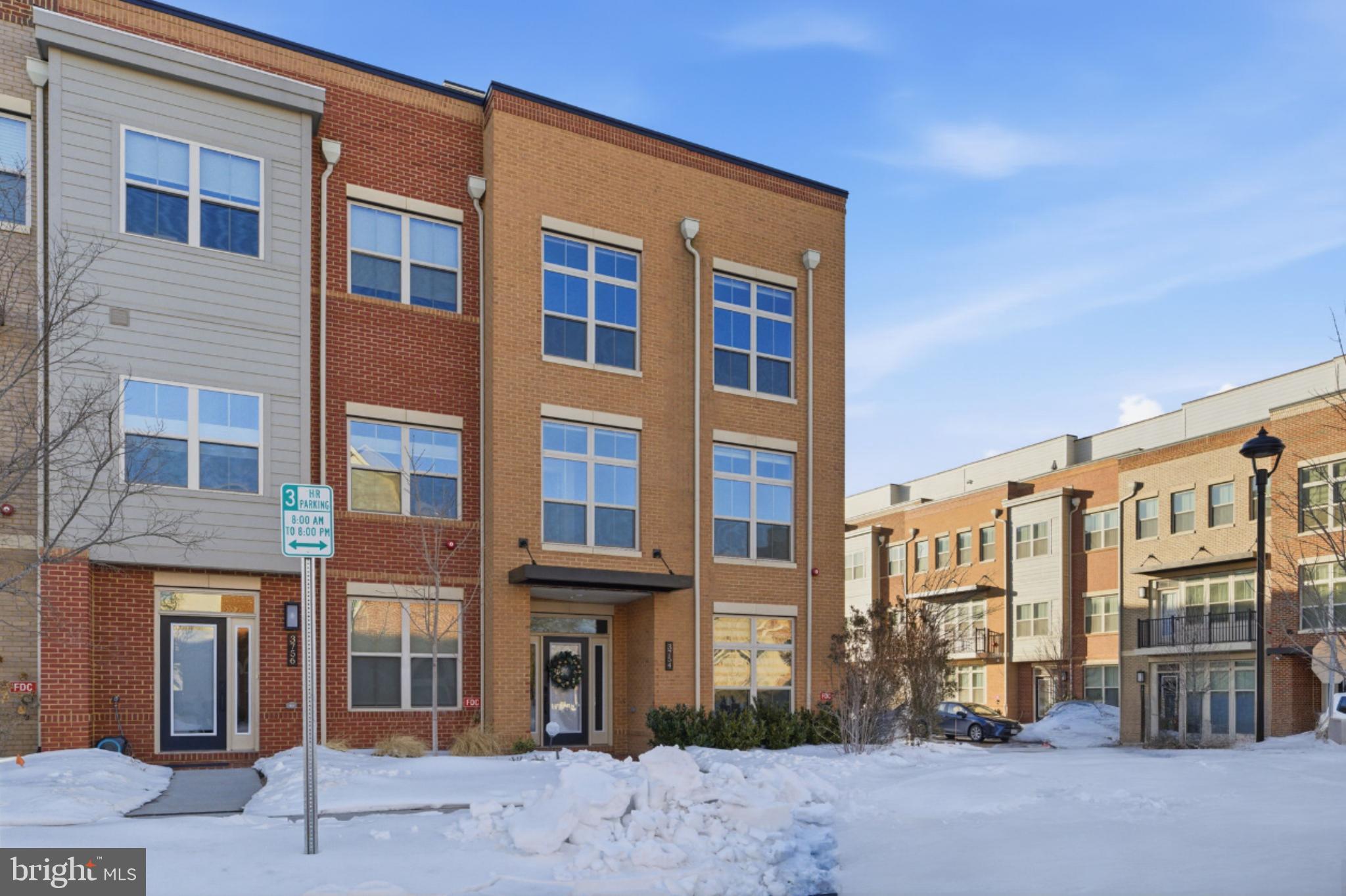 3754 Mayors Way Fairfax, VA 22030 - Photo 2 of 57 a front view of a building with a street