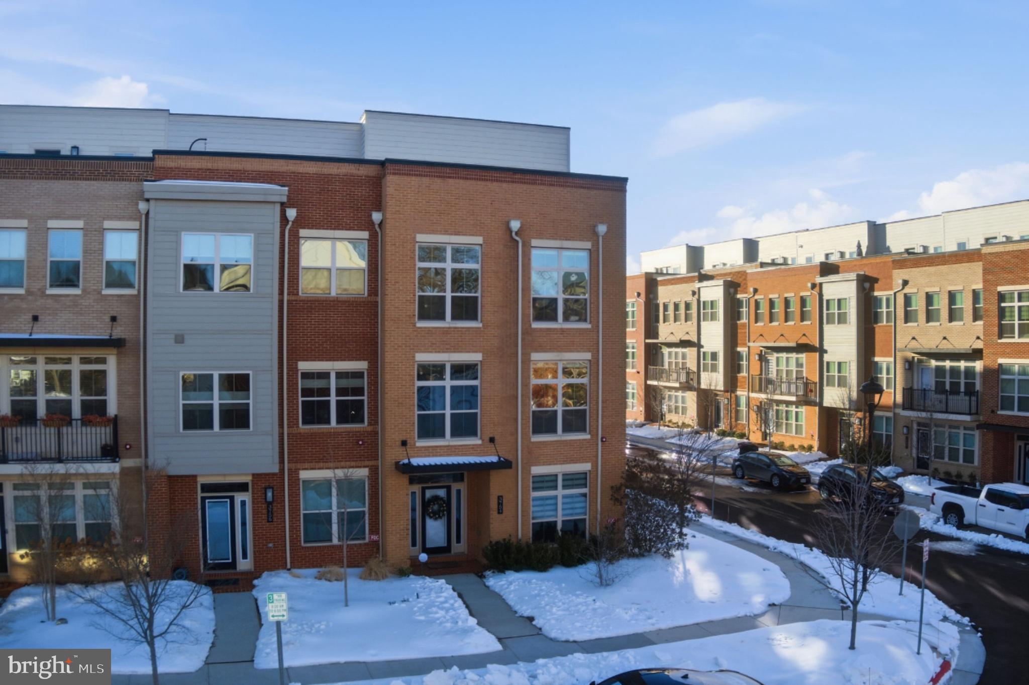 3754 Mayors Way Fairfax, VA 22030 - Photo 3 of 57 a city street lined with tall buildings