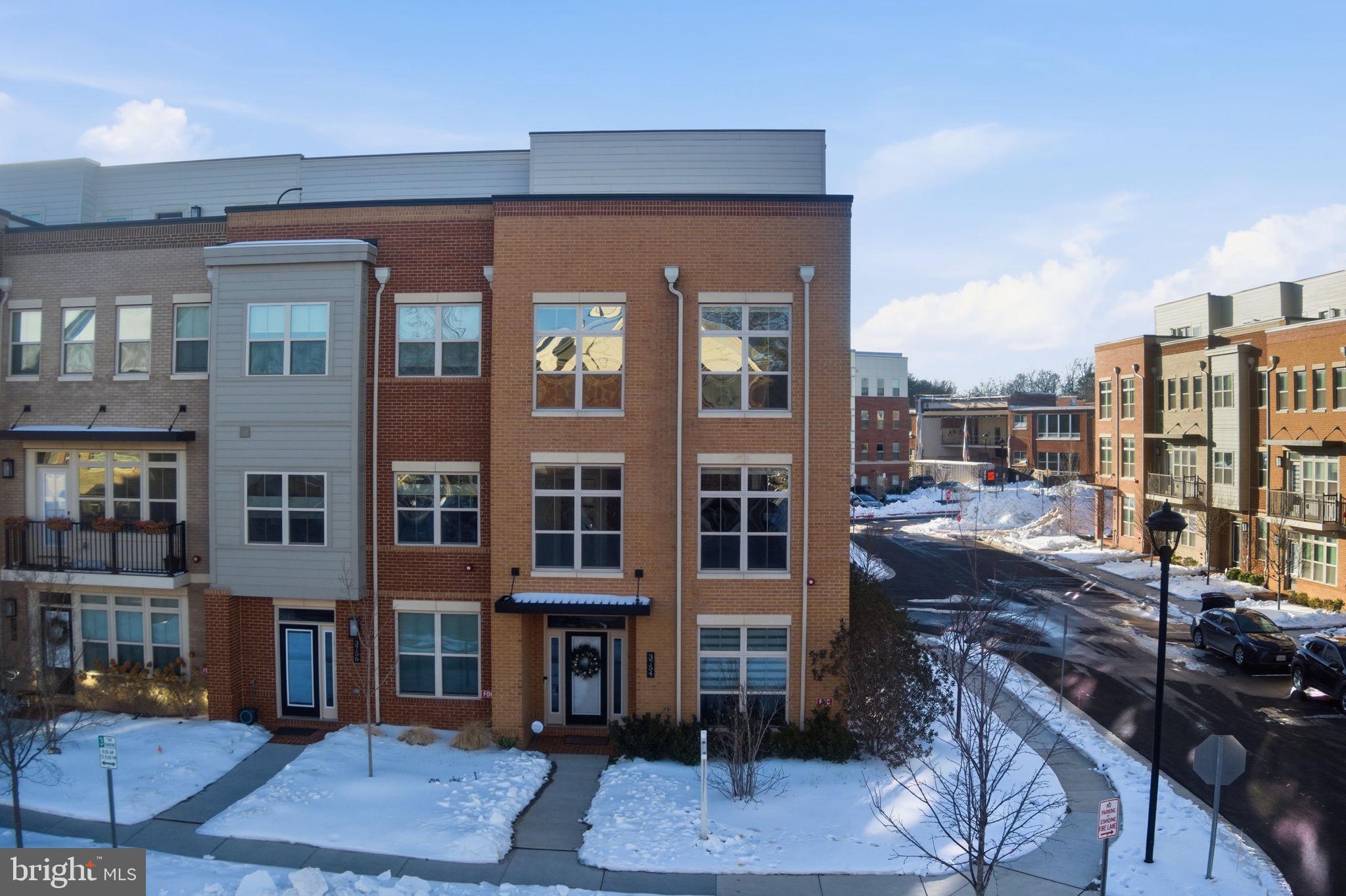 3754 Mayors Way Fairfax, VA 22030 - Photo 4 of 57 a front view of a building with a street