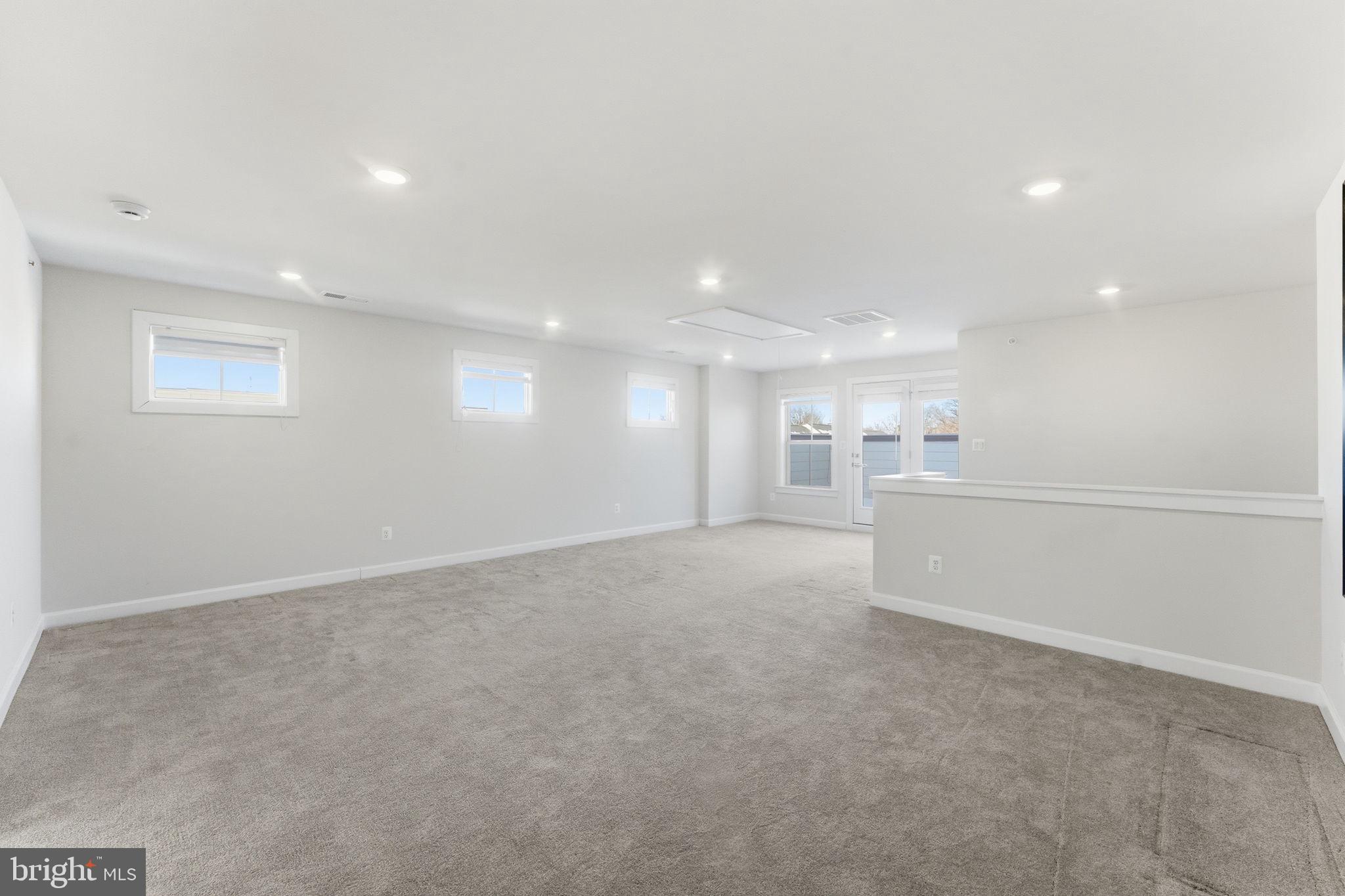 3754 Mayors Way Fairfax, VA 22030 - Photo 48 of 57 a view of an empty room with a kitchen