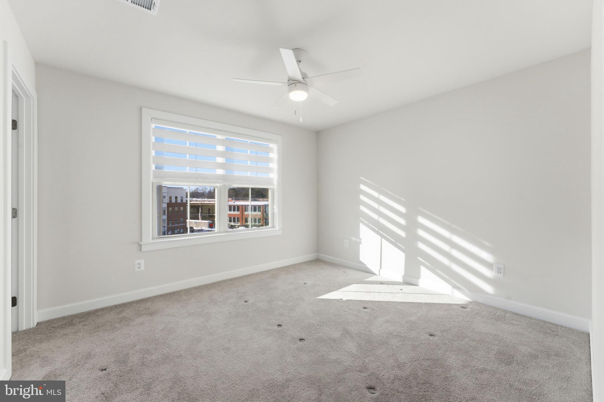 3754 Mayors Way Fairfax, VA 22030 - Photo 49 of 57 a view of an empty room with a window