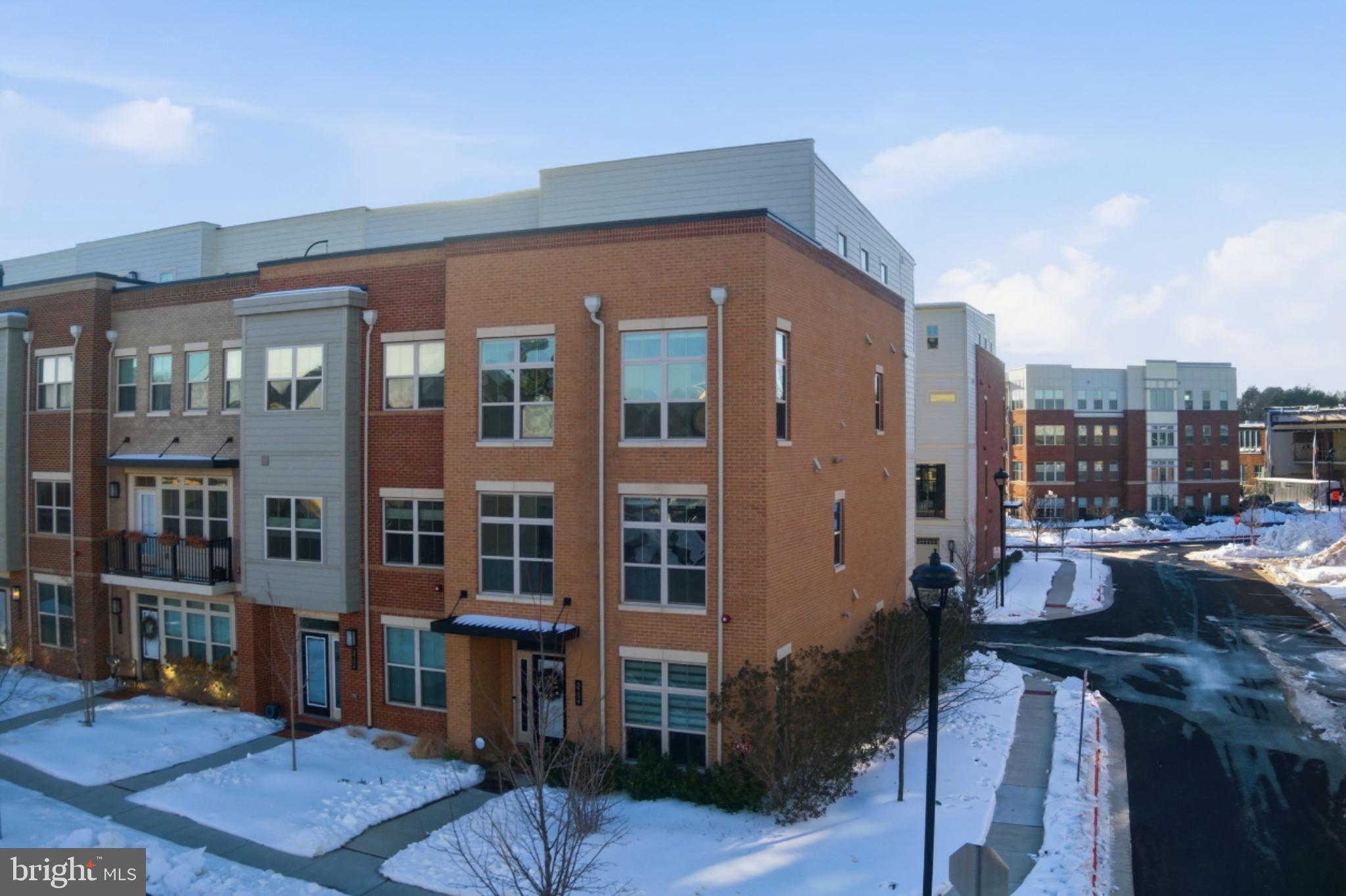 3754 Mayors Way Fairfax, VA 22030 - Photo 5 of 57 a front view of a house with a yard