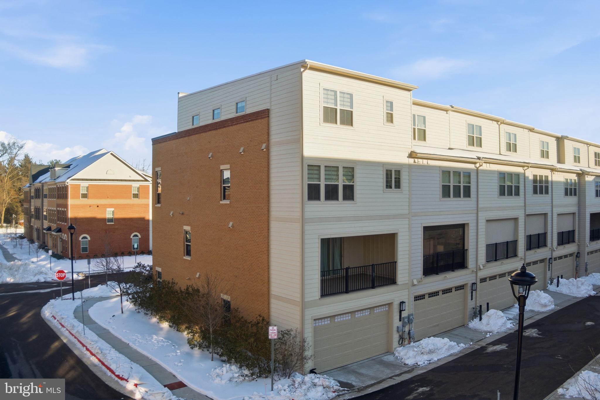 3754 Mayors Way Fairfax, VA 22030 - Photo 55 of 57 a front view of a house with garden