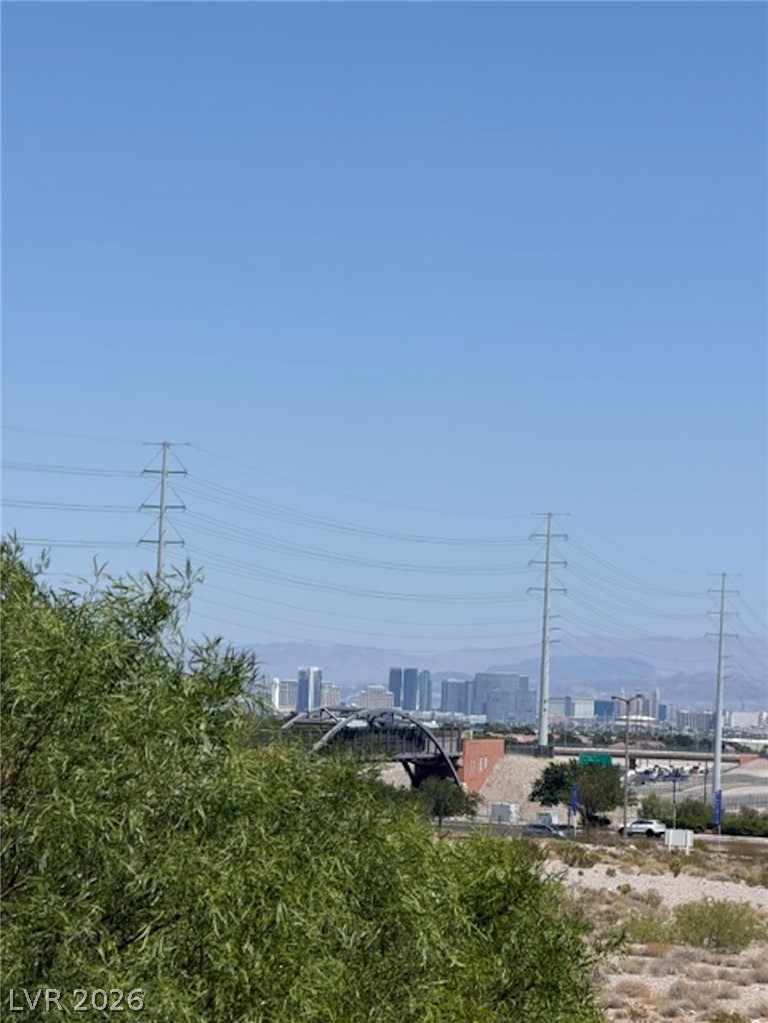 3862 Landing Ridge Place Las Vegas, NV 89135 - Photo 17 of 26 City skyline views create a dynamic backdrop to this elevated desert landscape.