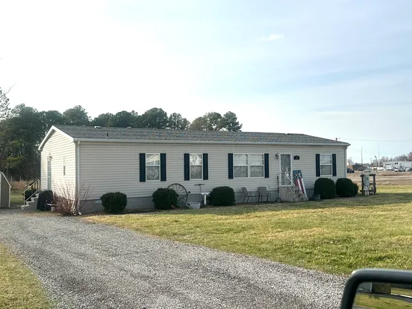 a view of a yard in front of a house
