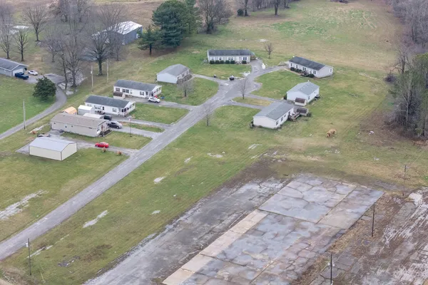 an aerial view of a house with garden