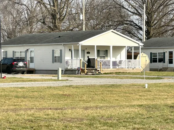 a view of a house with a swimming pool