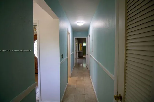 a view of hallway with stairs