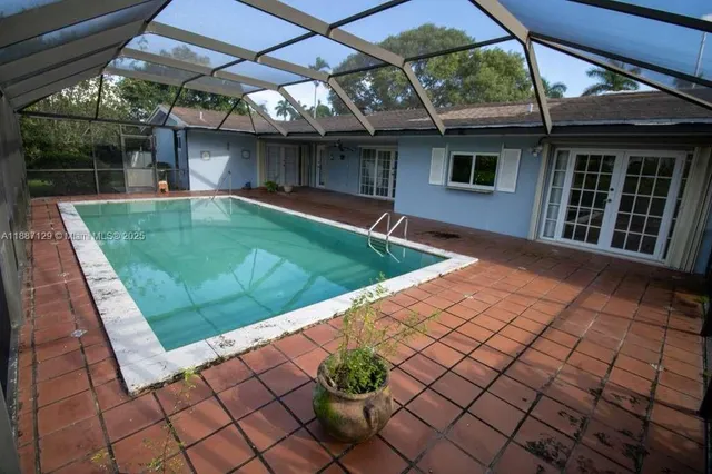 a view of a backyard with a patio