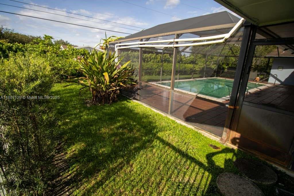 9041 Southwest 88th Street, Unit 9041 Miami, FL 33173 - Photo 10 of 34 a view of a garden