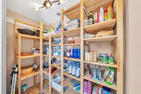 a patio with patio table and chairs