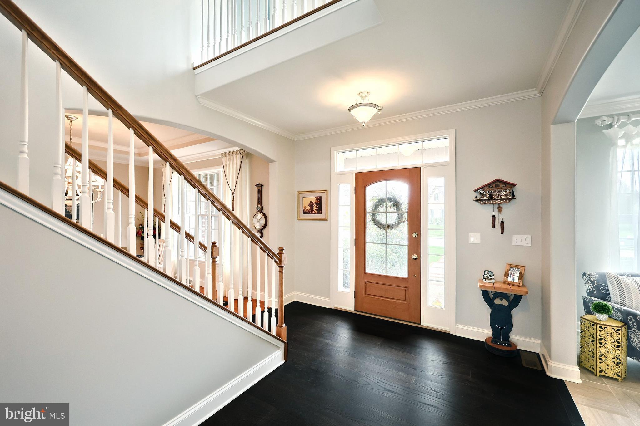 2119 Bernays Drive York, PA 17404 - Photo 20 of 72 a view of an entryway with wooden floor and stairs