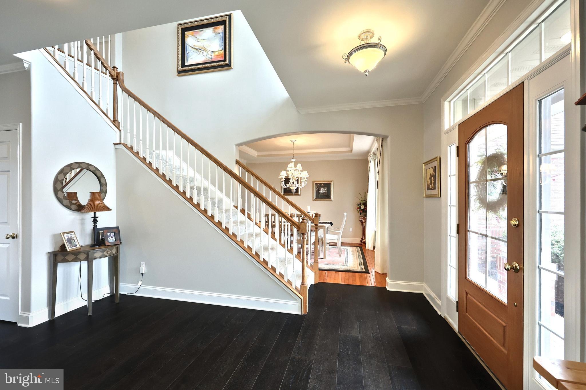 2119 Bernays Drive York, PA 17404 - Photo 22 of 72 a view of staircase with wooden floor and a window