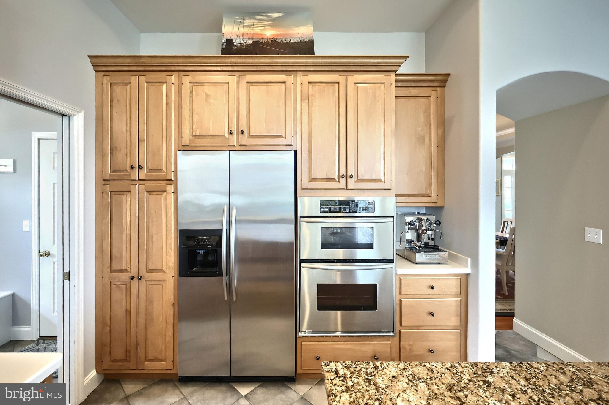 2119 Bernays Drive York, PA 17404 - Photo 36 of 72 a kitchen with stainless steel appliances kitchen island granite countertop a refrigerator and a stove